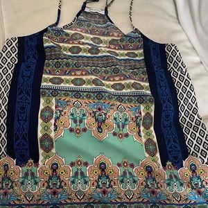 Cute silky polyester women’s top.